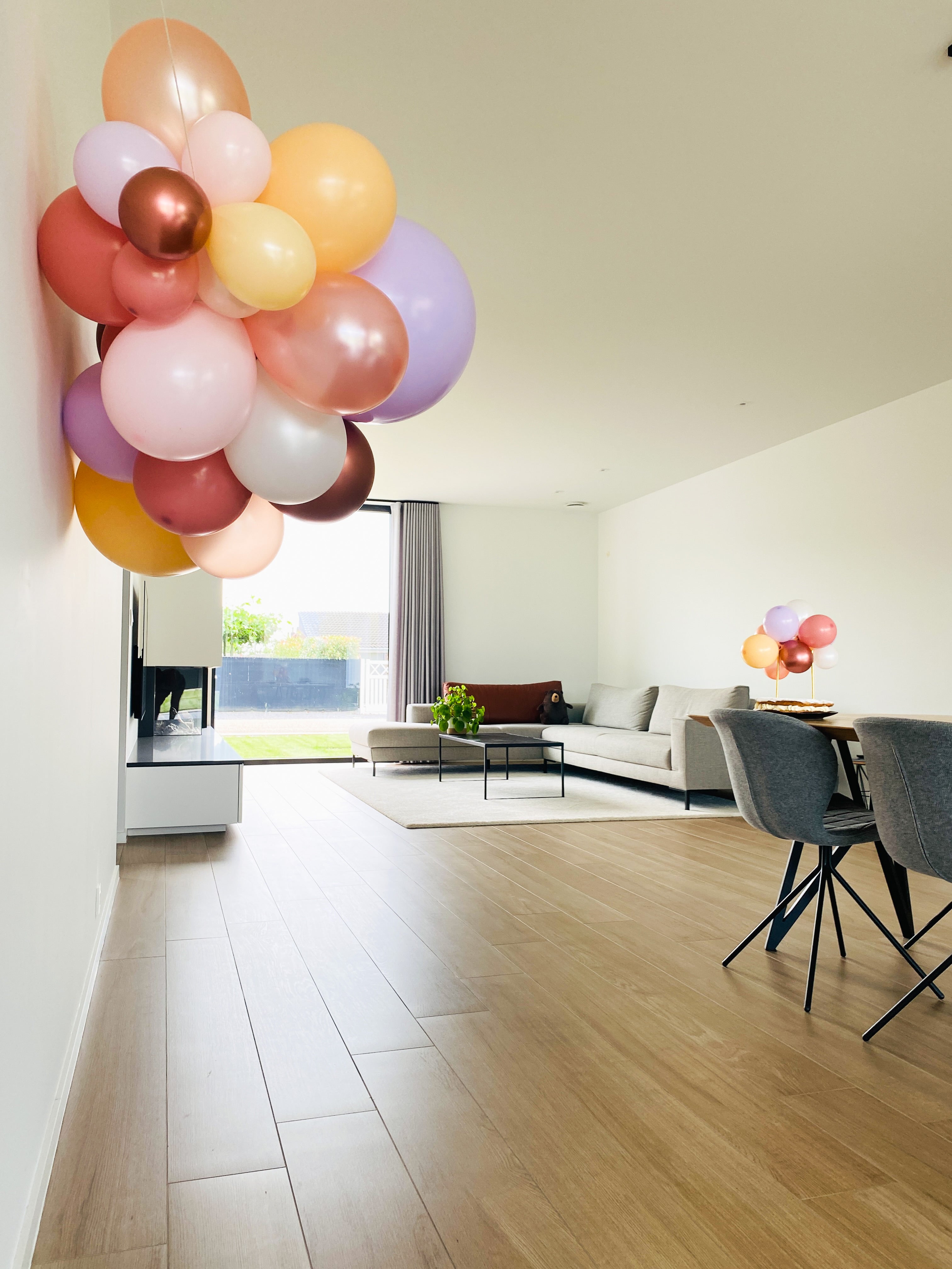 Ballonslinger ballonnenboog oranje blush roze paars wit brons pastel als feestdecoratie
