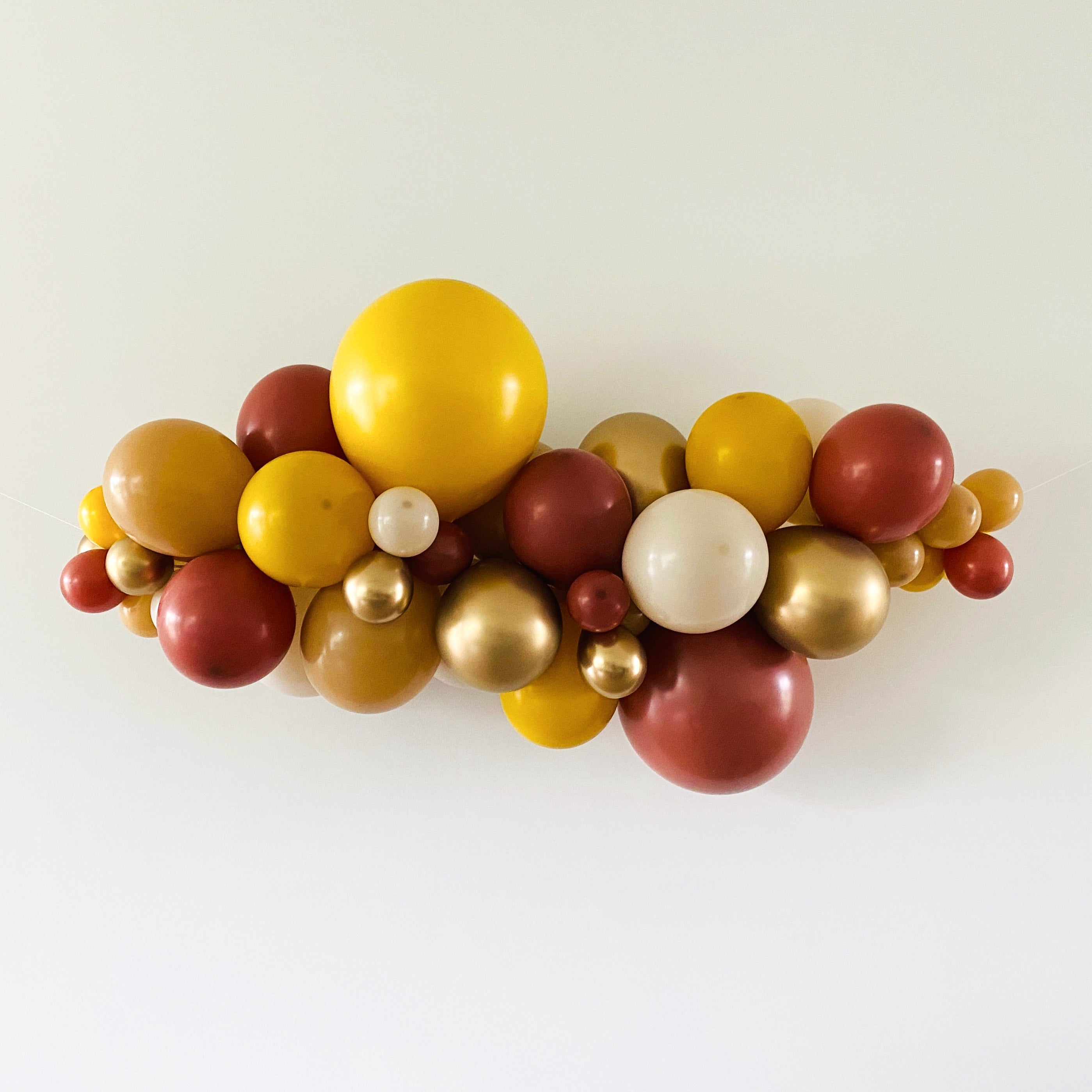 Ballonslinger ballonnenboog balloongarland Mustard Terracotta.jpg