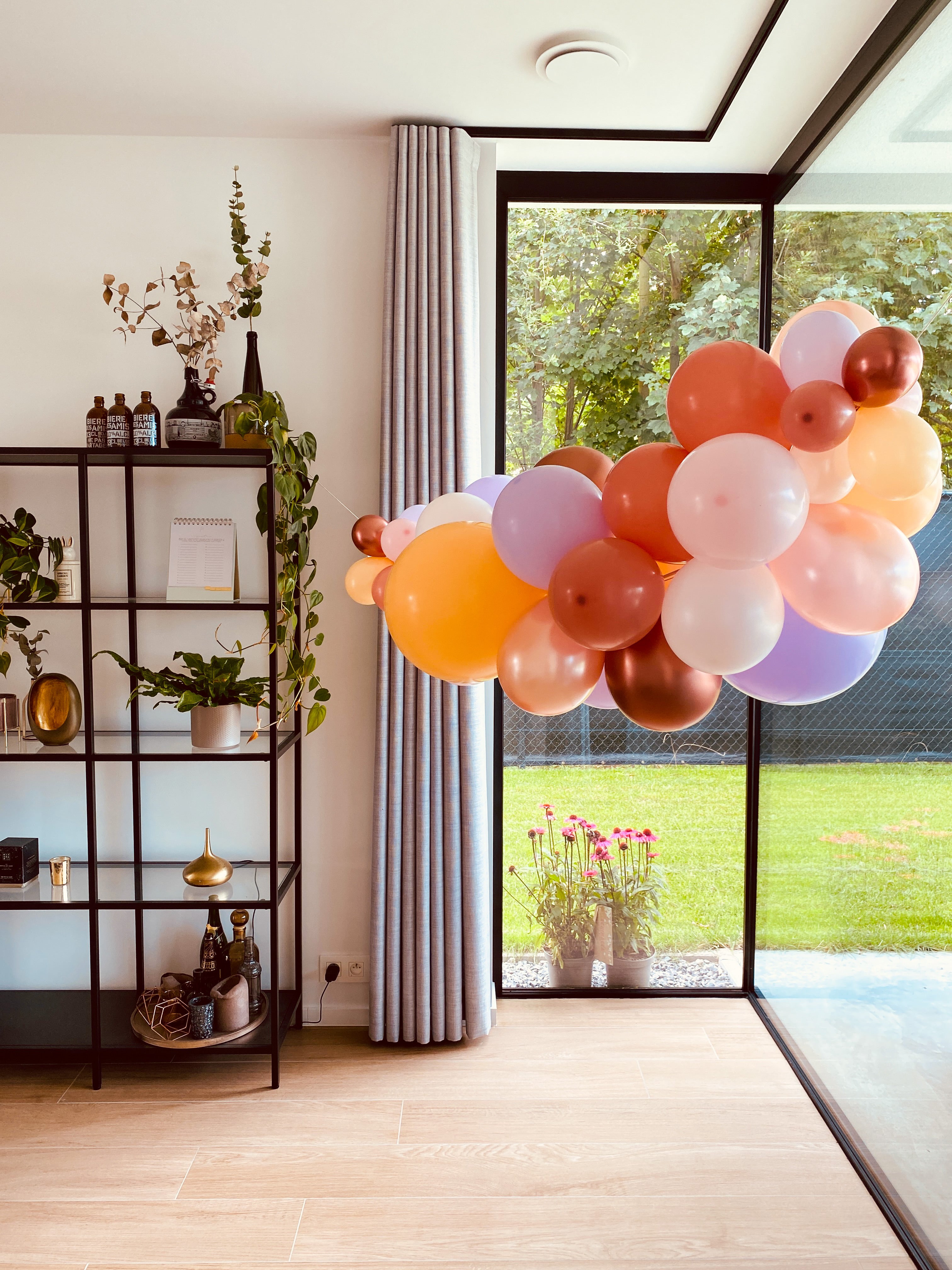 Ballonslinger ballonnenboog oranje blush roze paars wit brons pastel als feestdecoratie